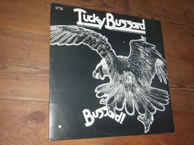 TUCKY BUZZARD. buzzard.